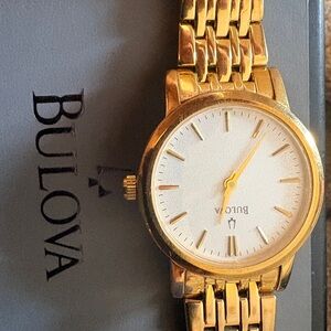 Bulova Gold Tone Timepiece with Classic White Face